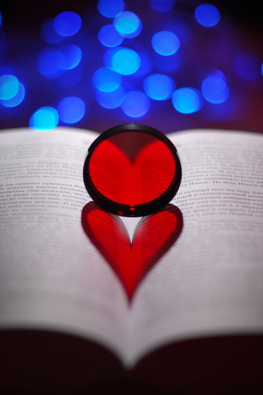 910x1365 HD wallpaper: heart reflection book page, glass, shadow, red, blue, frozen