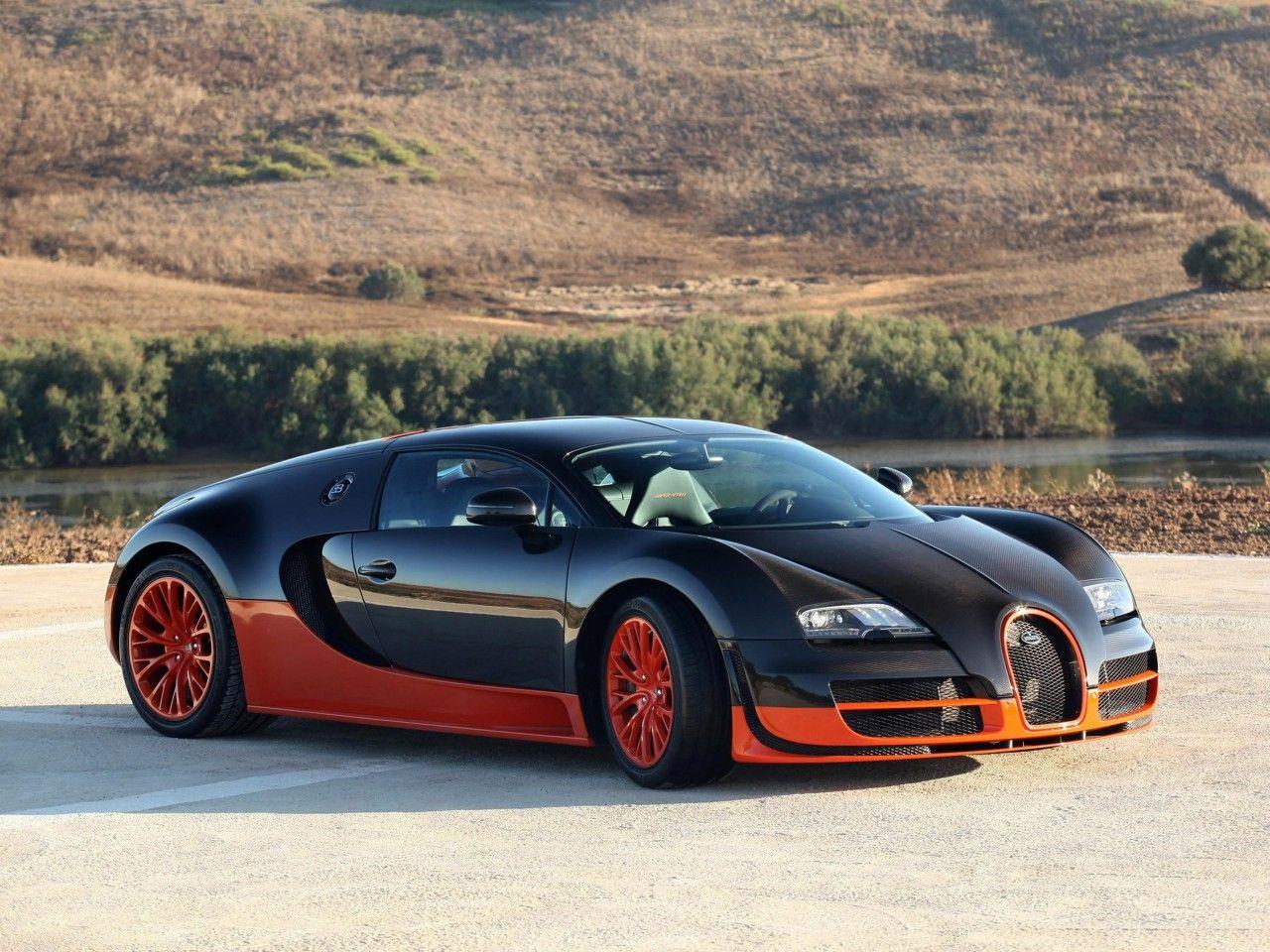 1280x960 Orange And Black Bugatti Veyron Parked .