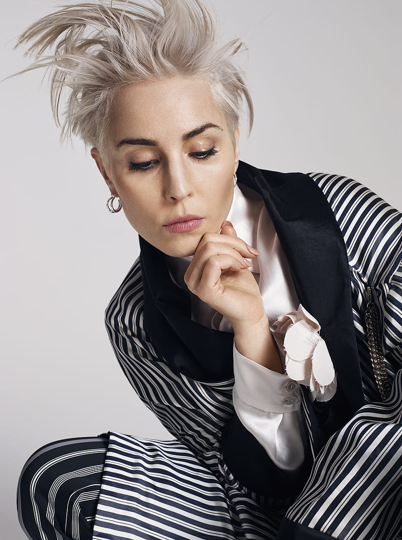 800x1075 Noomi Rapace, actress, blonde, brown eyes, earring, HD phone wallpaper