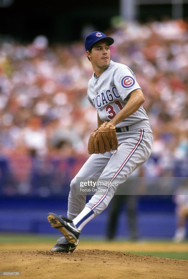 736x1090 CIRCA 1980's: Pitcher Greg Maddux of the Chicago Cubs pitches during