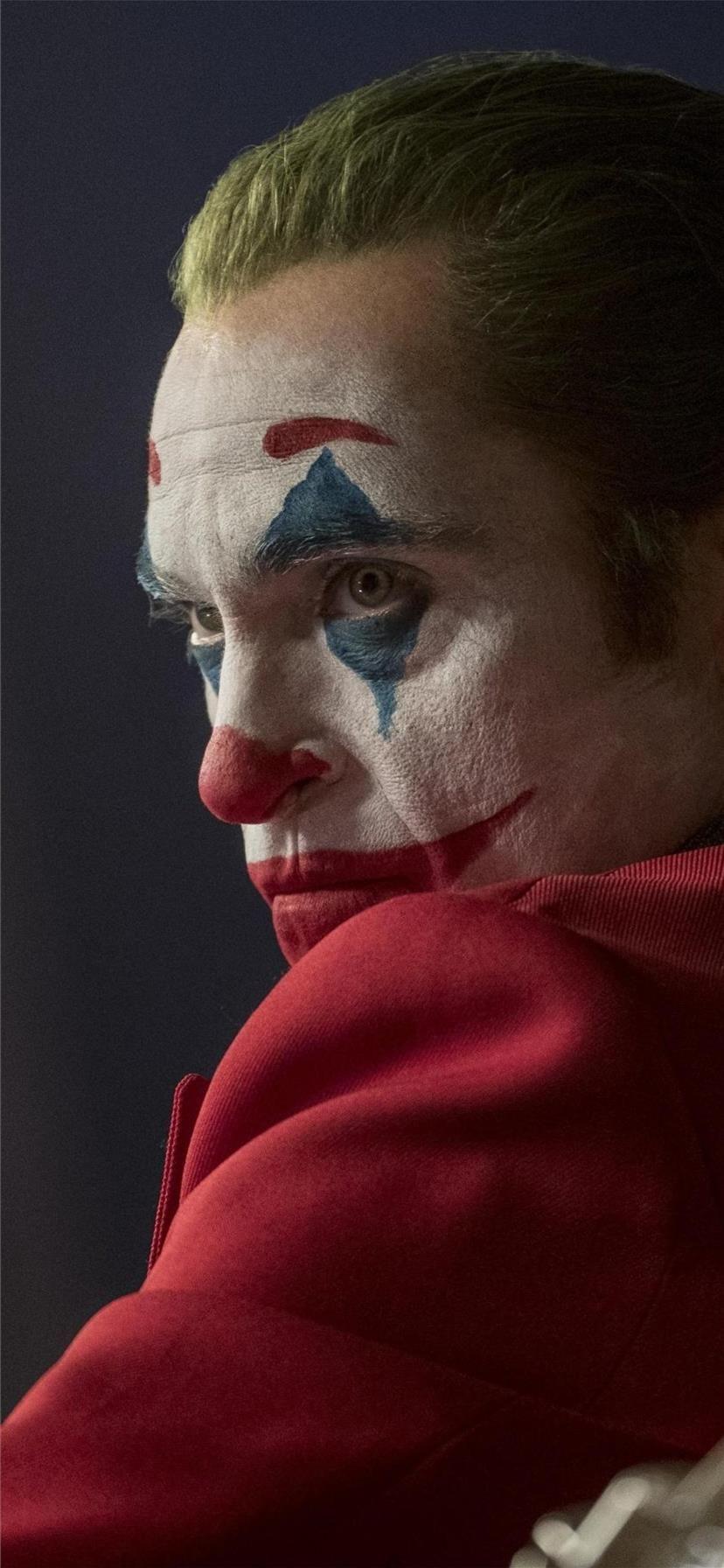 828x1792 joker joaquin phoenix movie iPhone X .
