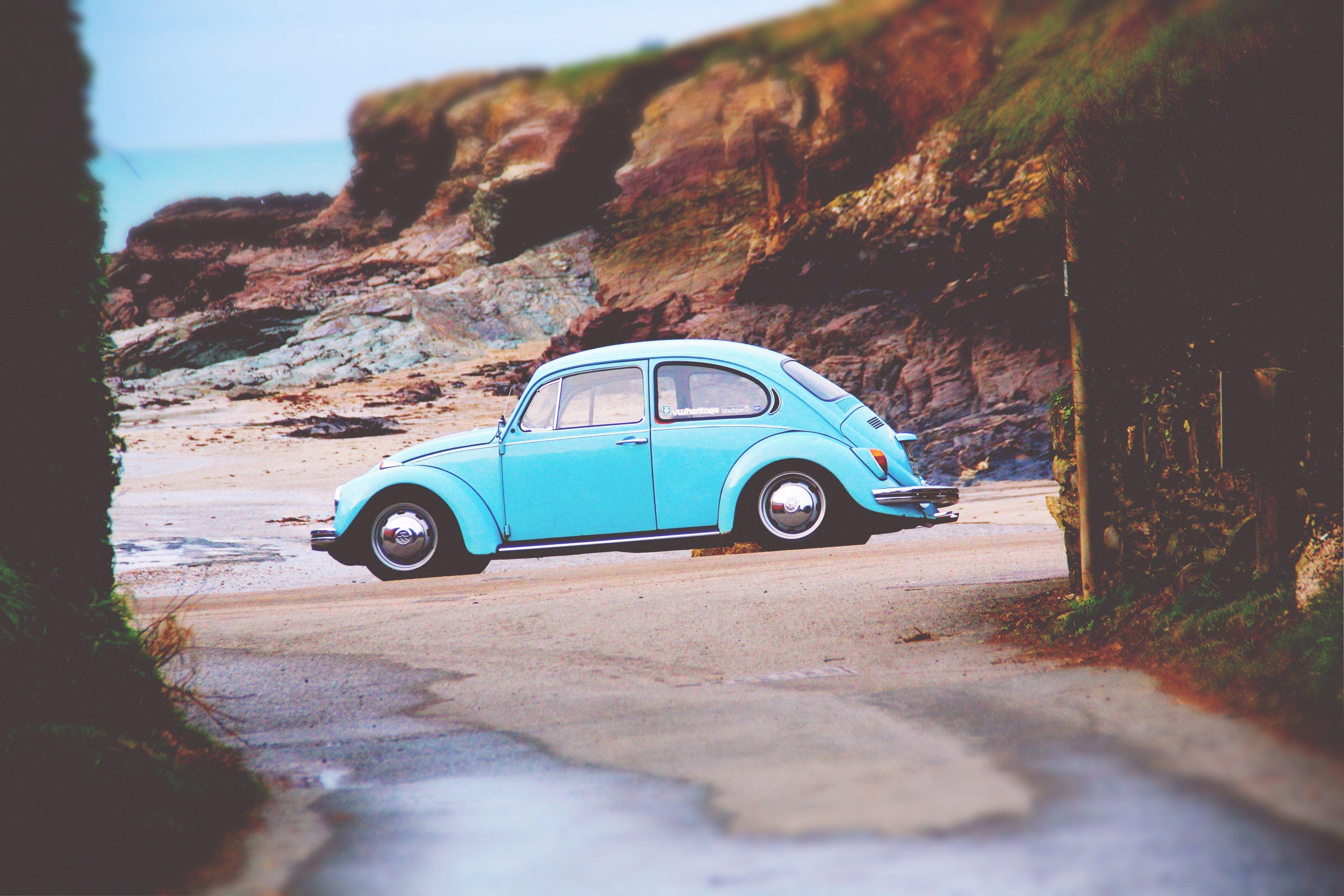 3840x2560 sky blue volkswagen beetle parked near .