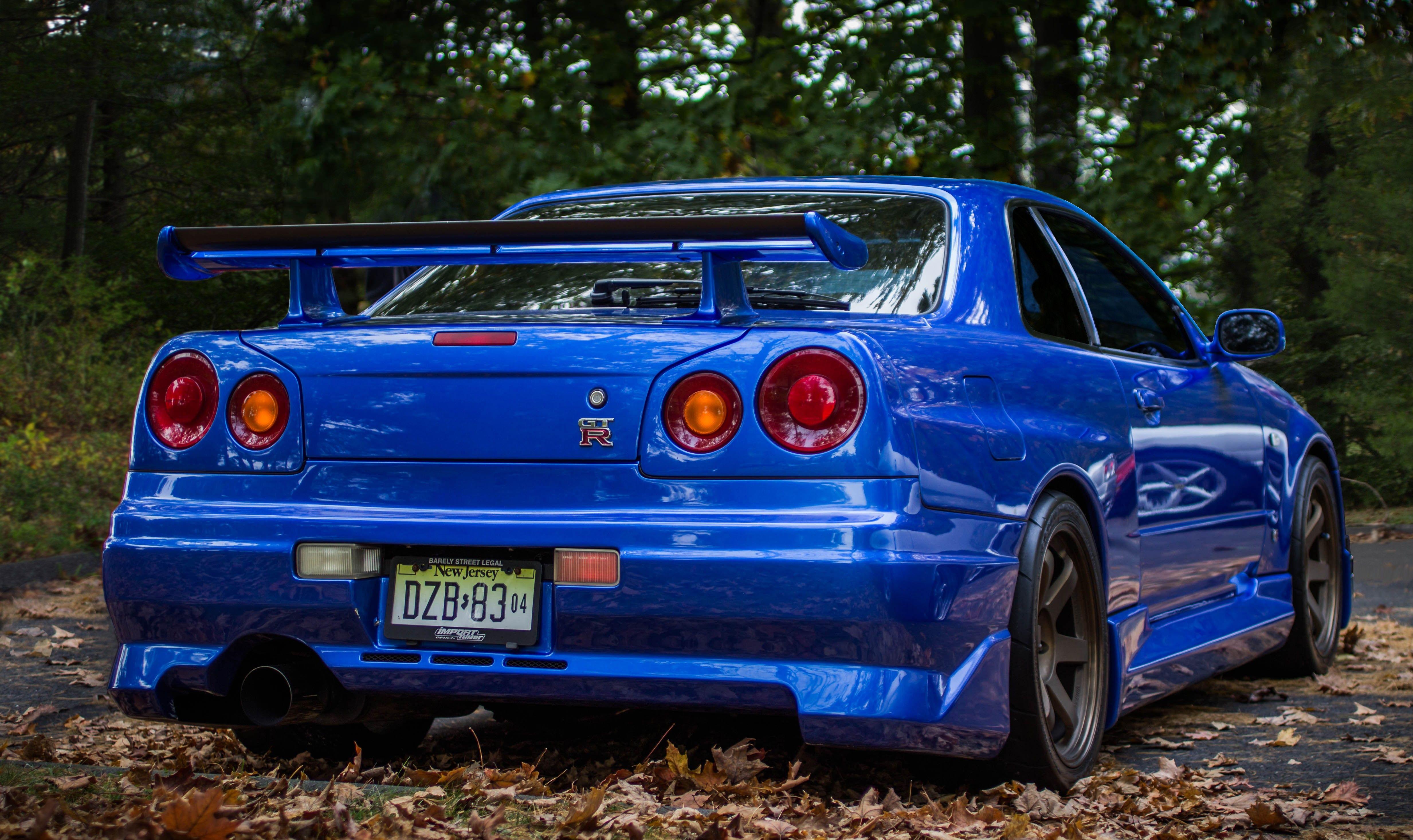 4932x2933 Skyline Car Wallpaper