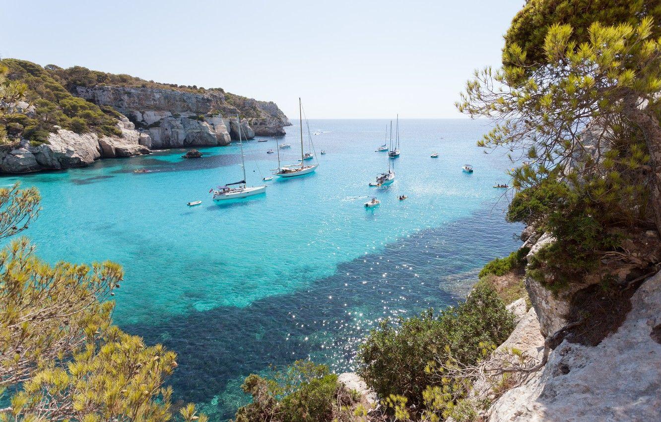 1332x850 Wallpaper ocean, rocks, sailboat, crystal clear water image for desktop, section природа