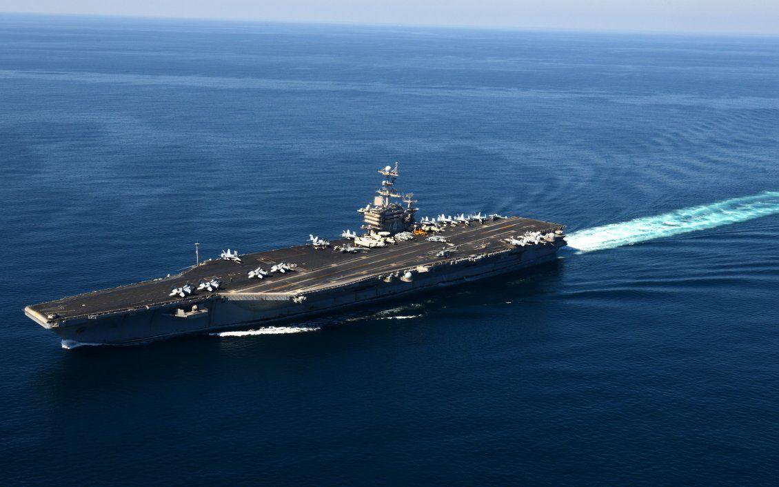 1130x706 Aircraft carrier military ship on the ocean
