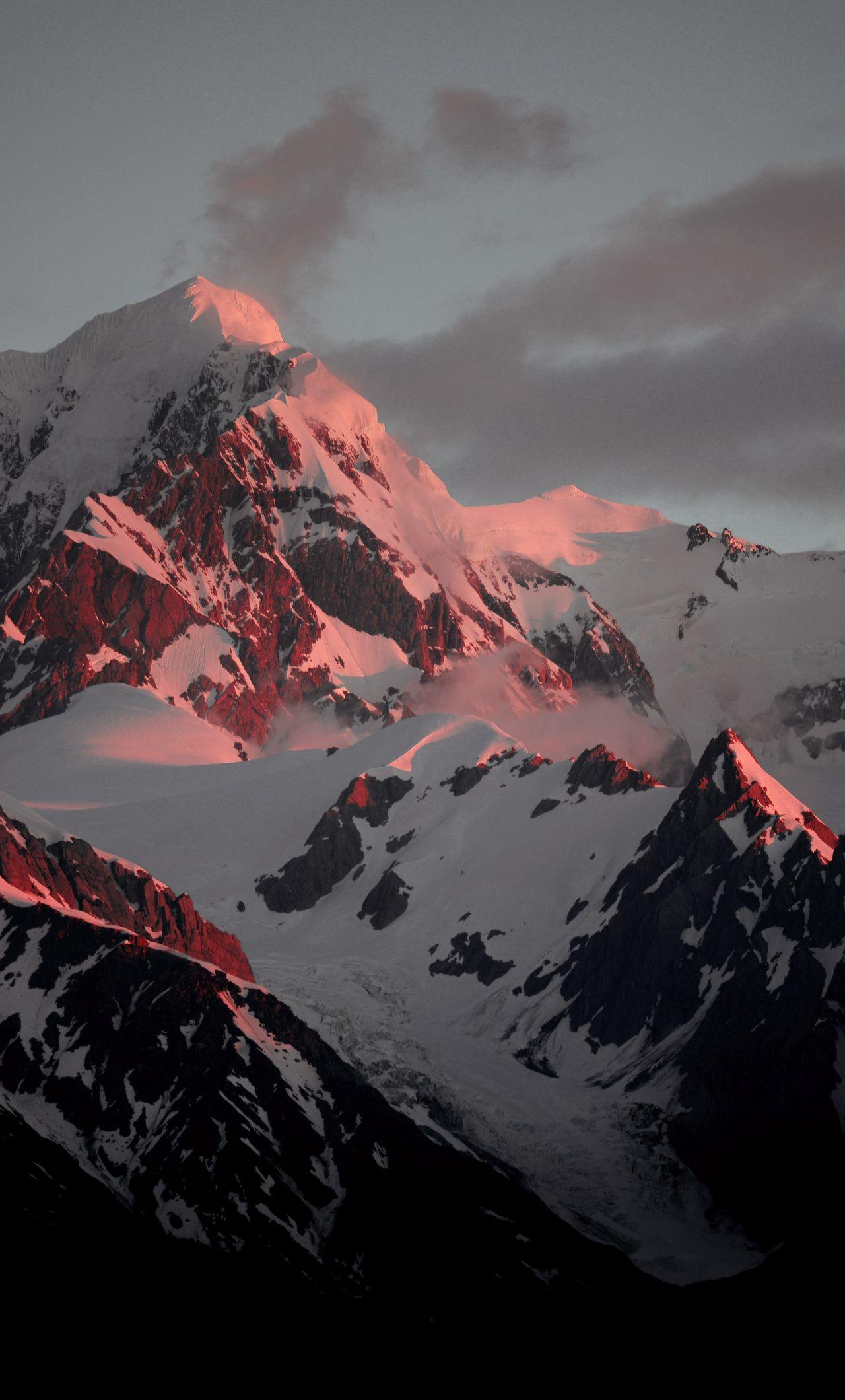 1280x2120 Download Snow mountains, sunset, glow .