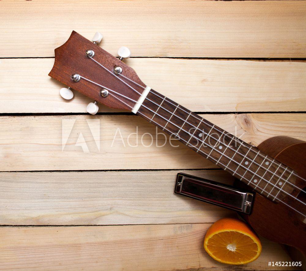 1000x884 Hawaiian Four Stringed Ukulele Guitar .wallsheaven.com · In stock