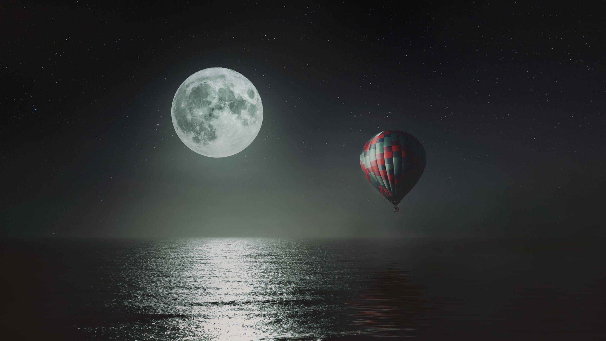 2560x1440 air balloon over the night sky
