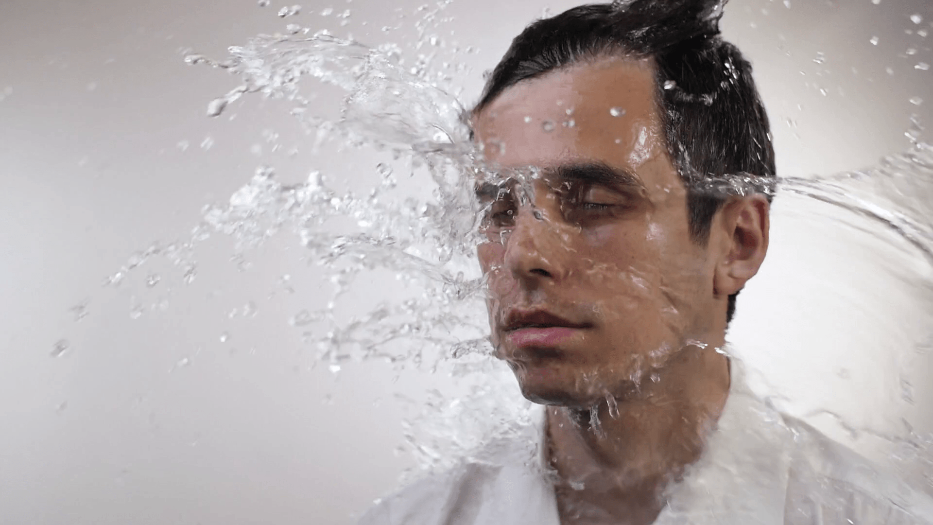 1920x1080 Water splash on face of a man