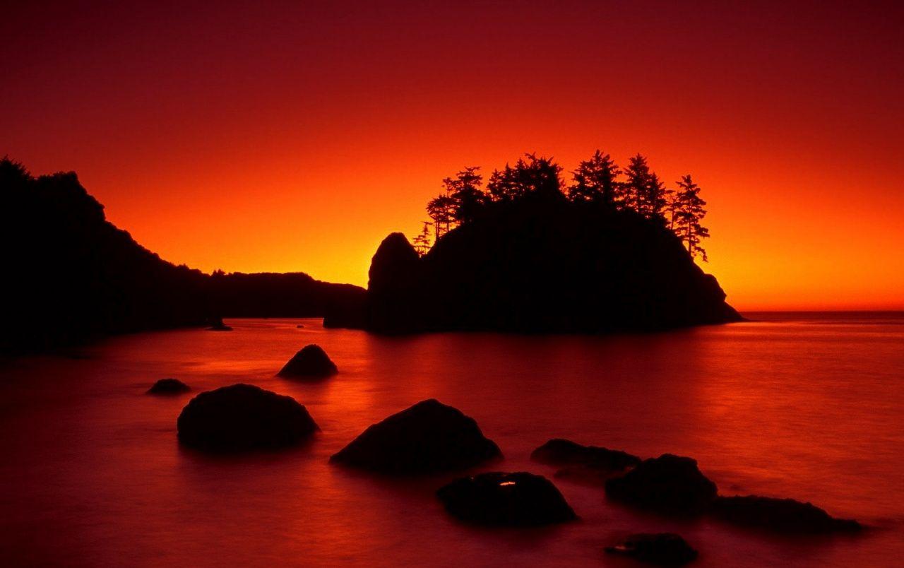1280x804 Red Sunset Ocean & Dark Island