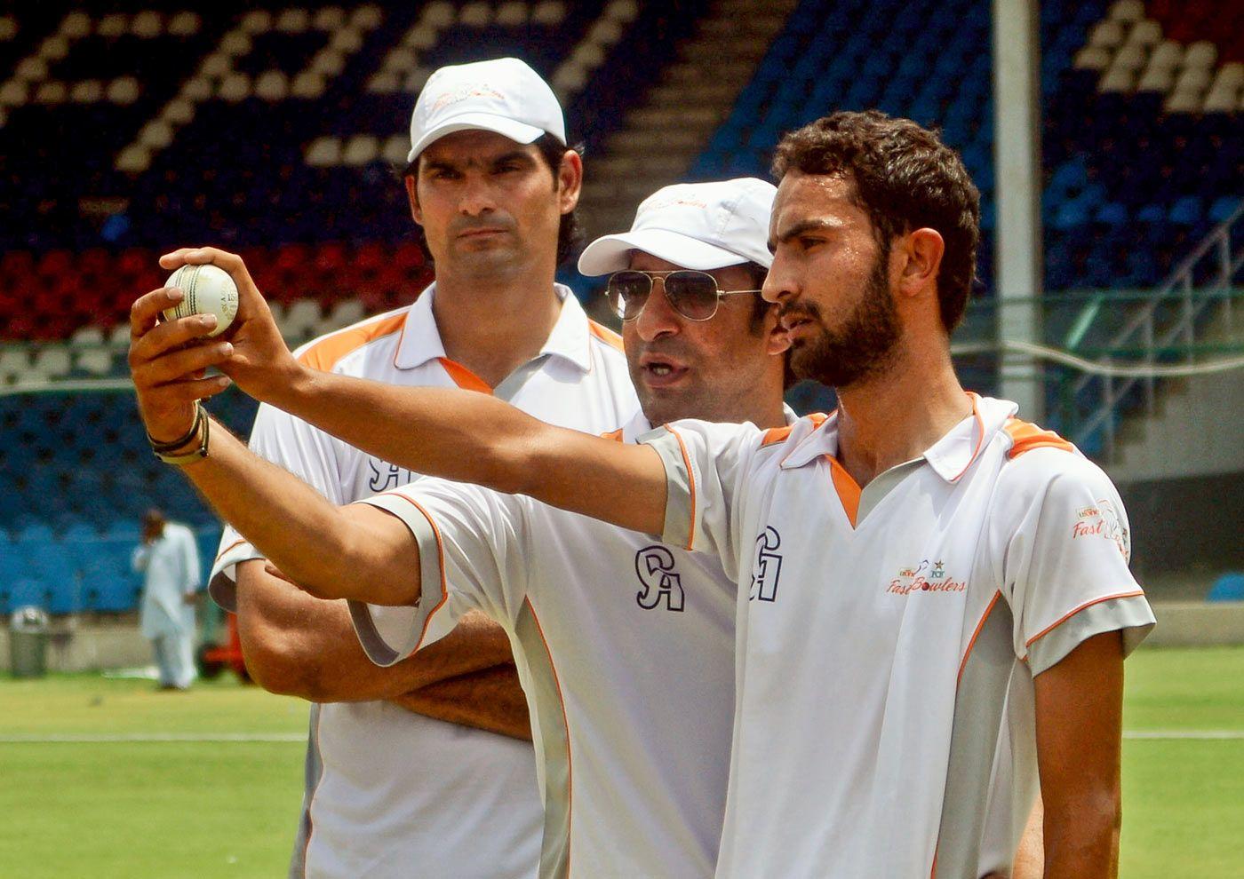 1400x990 Michael Holding and Wasim Akram. The .