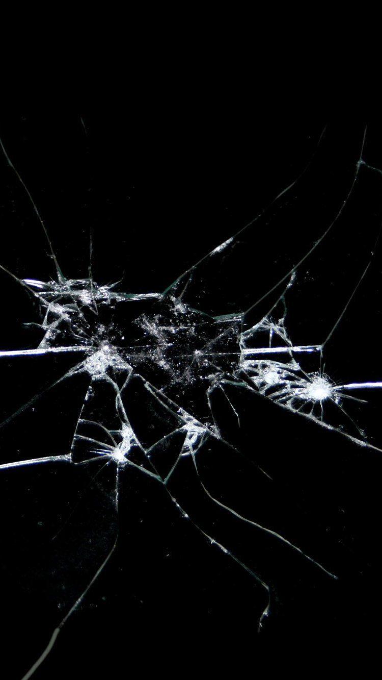750x1333 Broken glass shattered black background .