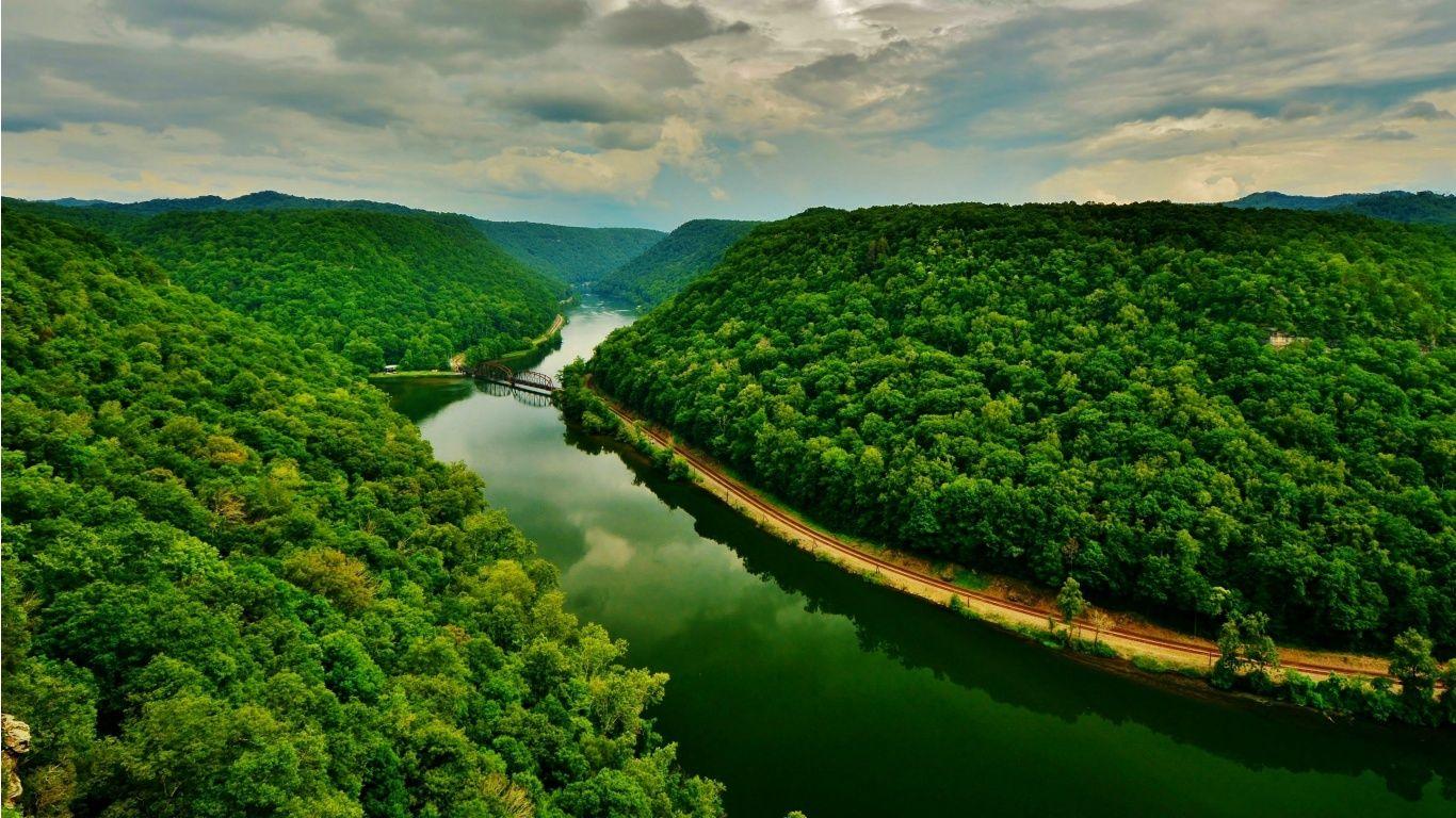 1366x768 Mountains Trees River Landscape Wallpaper
