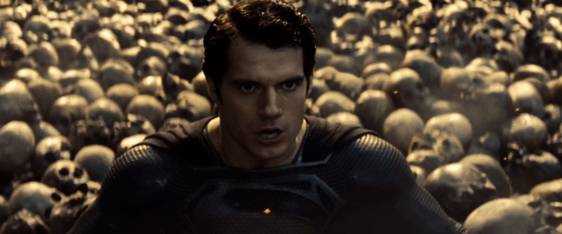 1920x800 Superman wears the black suit .