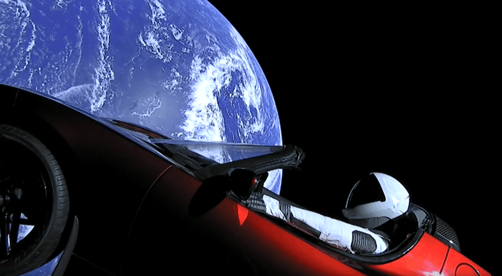1694x934 Tesla Car In Space