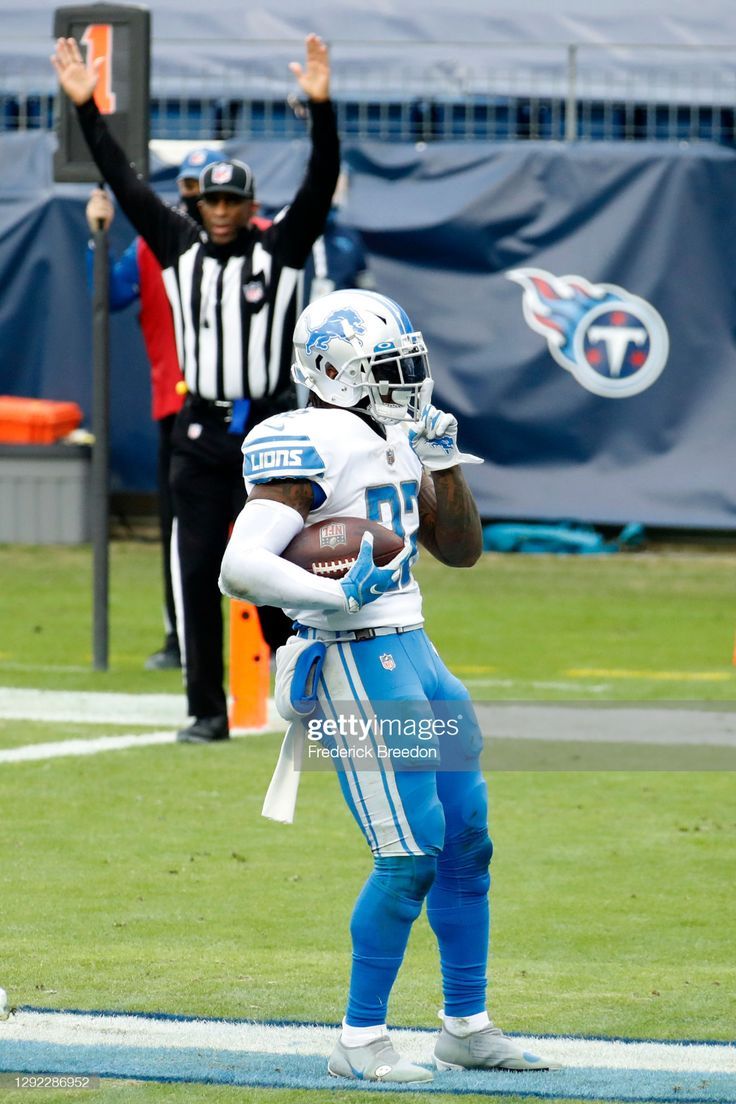 736x1104 Running back D'Andre Swift of the Detroit Lions celebrates after