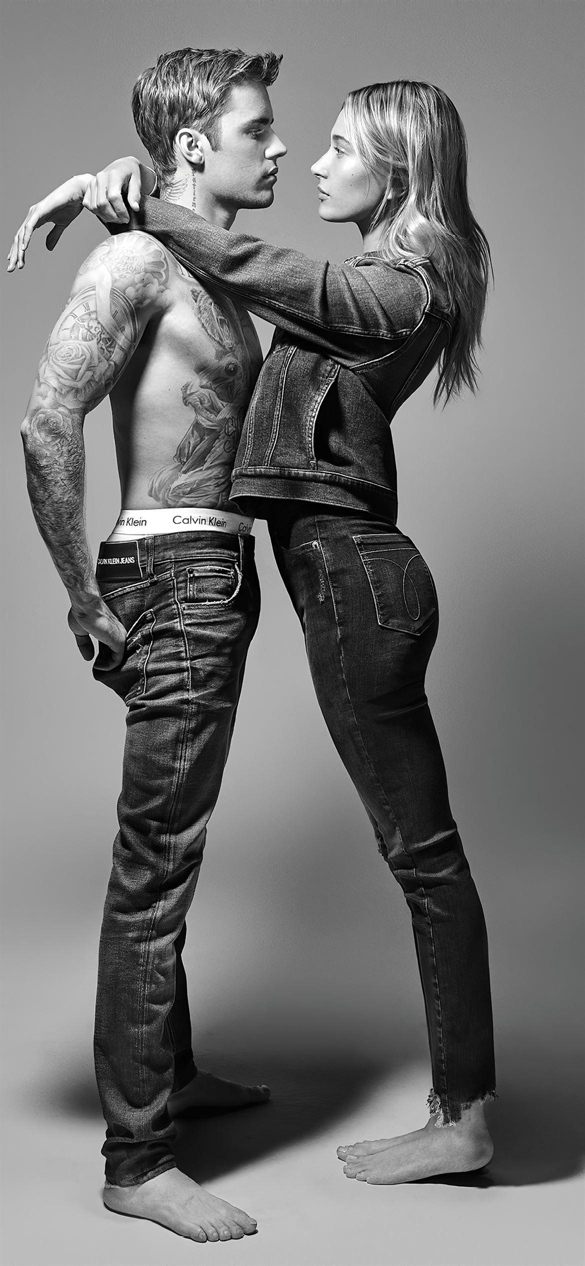 1170x2532 hailey bieber and justin bieber calvin klien iPhone SE Wallpaper Free Download
