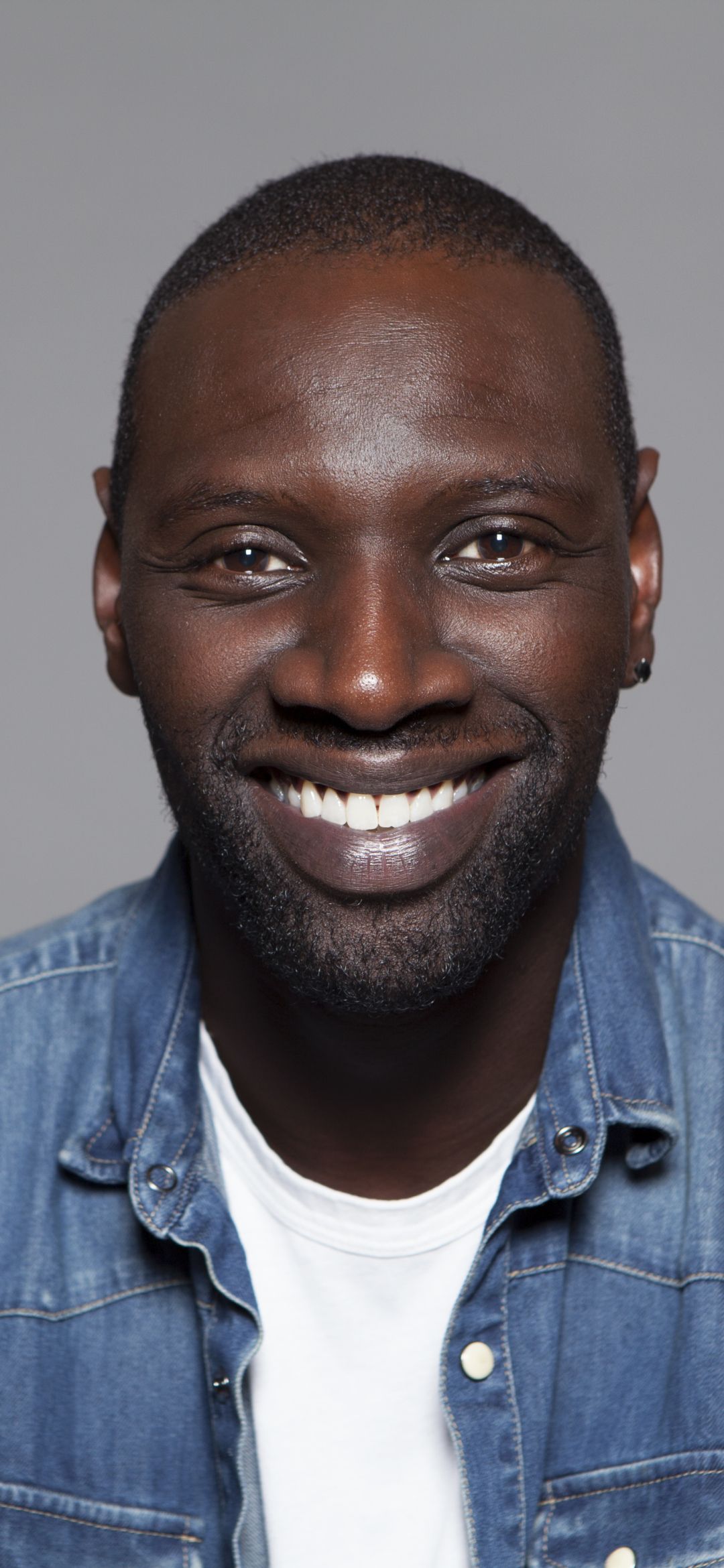 1080x2340 Phone wallpaper: Celebrity, Omar Sy, Smile, French, Actor 1394349