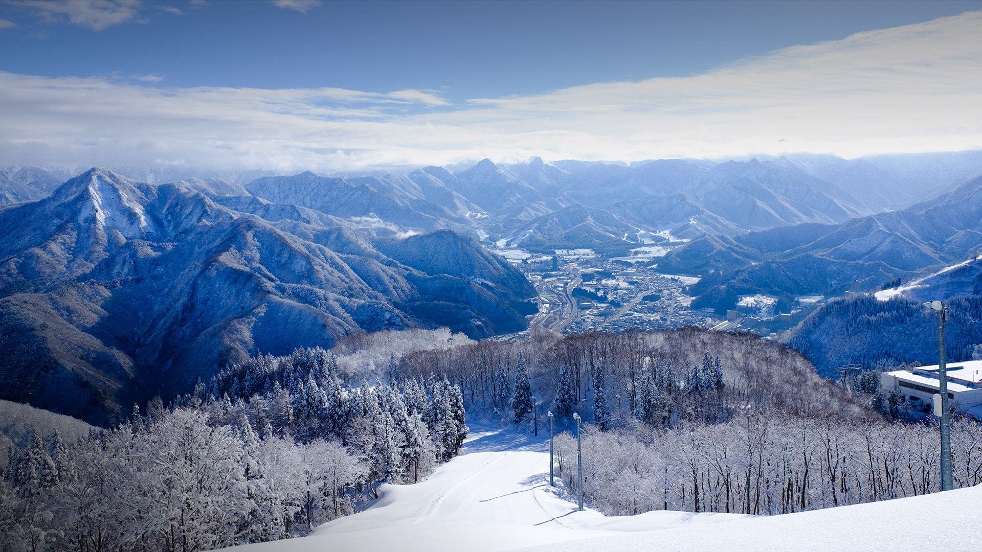 1920x1080 Ski slope and snowy mountains, Gala Yuzawa Ski resort, Niigata, Japan. Windows Spotlight Image