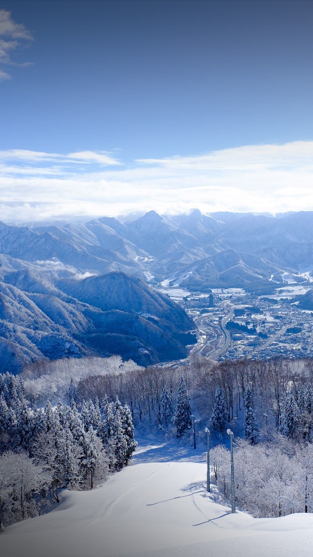 1080x1920 Ski slope and snowy mountains, Gala Yuzawa Ski resort, Niigata, Japan. Windows Spotlight Image