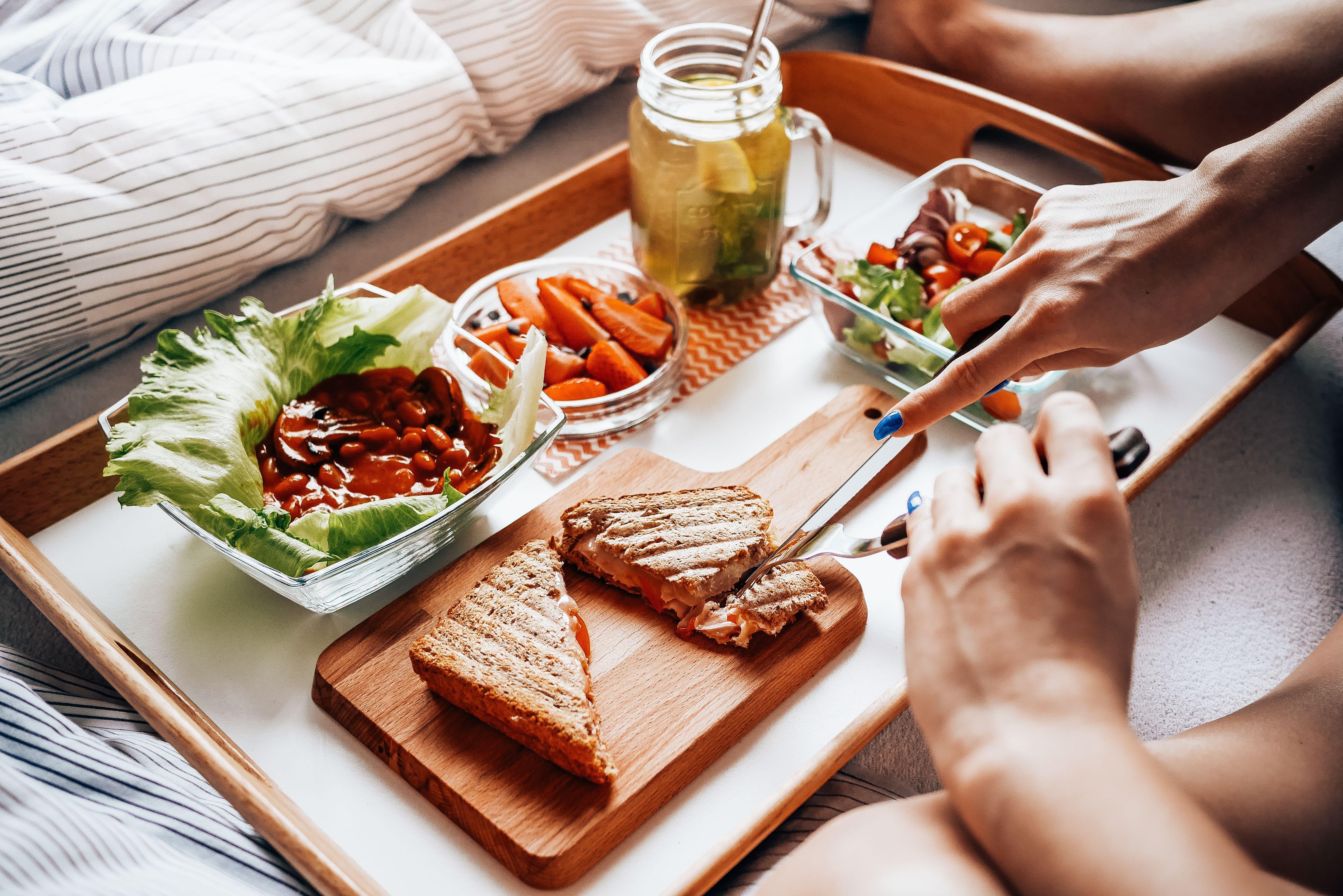 4592x3064 Young Woman Enjoying Morning Breakfast in Bed Free