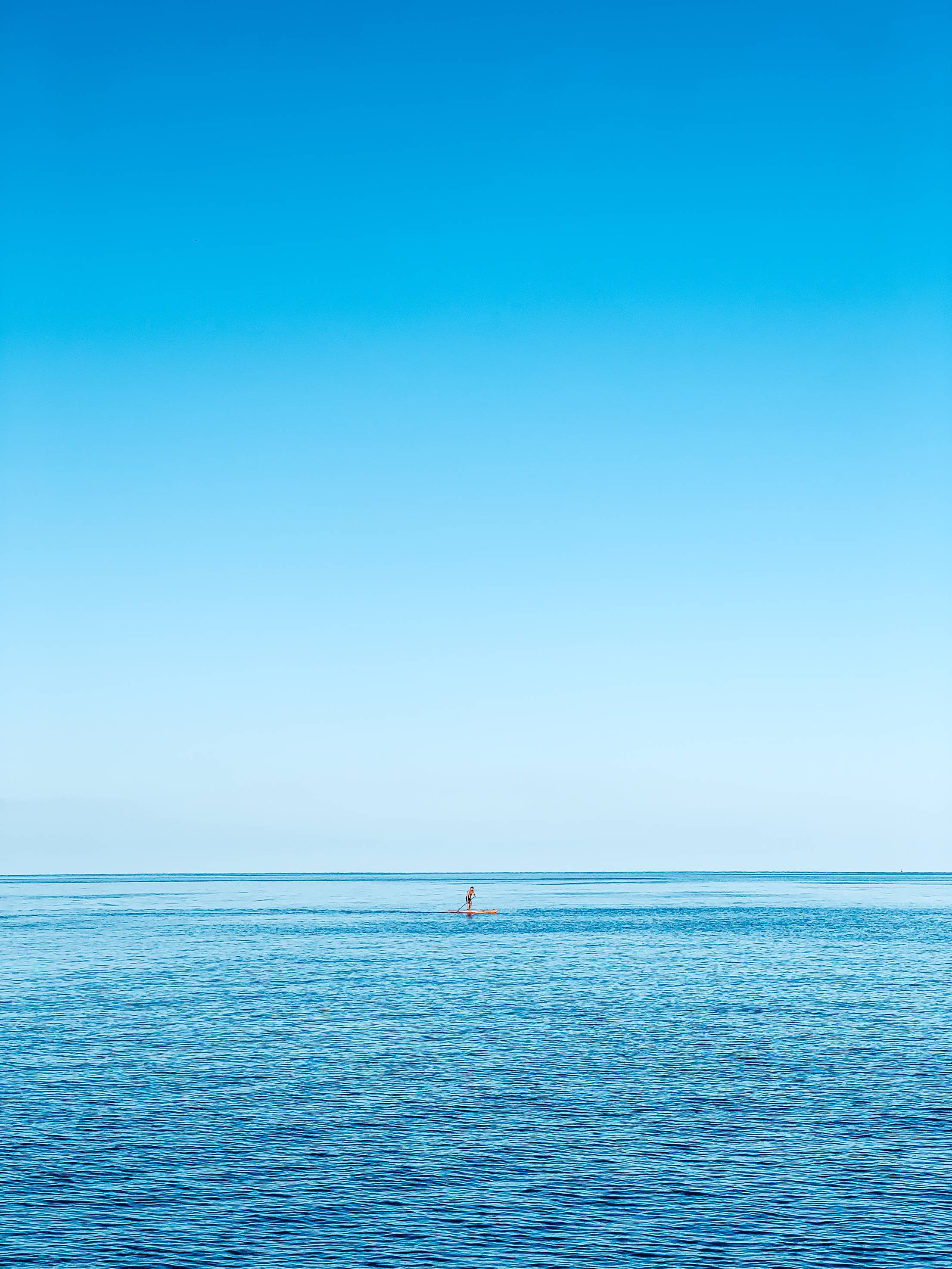2210x2946 Man on a Paddleboard on the Open Sea. Free Summer Image