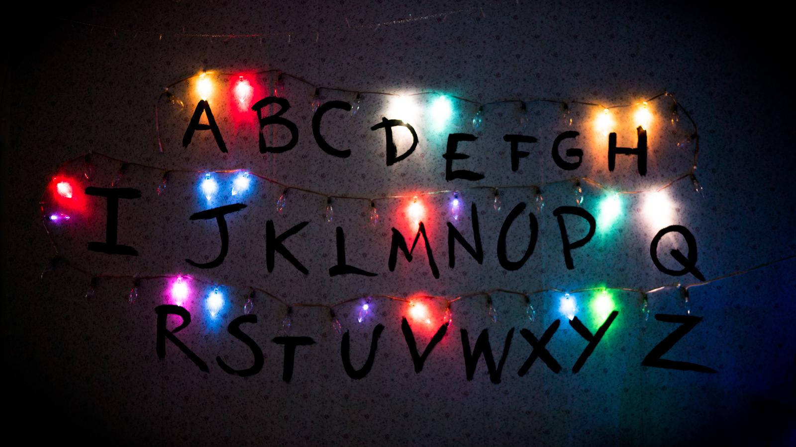 1600x900 Download Understand The Upside Down With This Alphabet Of Lights From Stranger Things Wallpaper