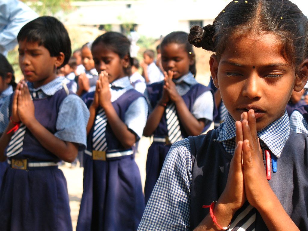 1024x768 Indian school children at morning prayer