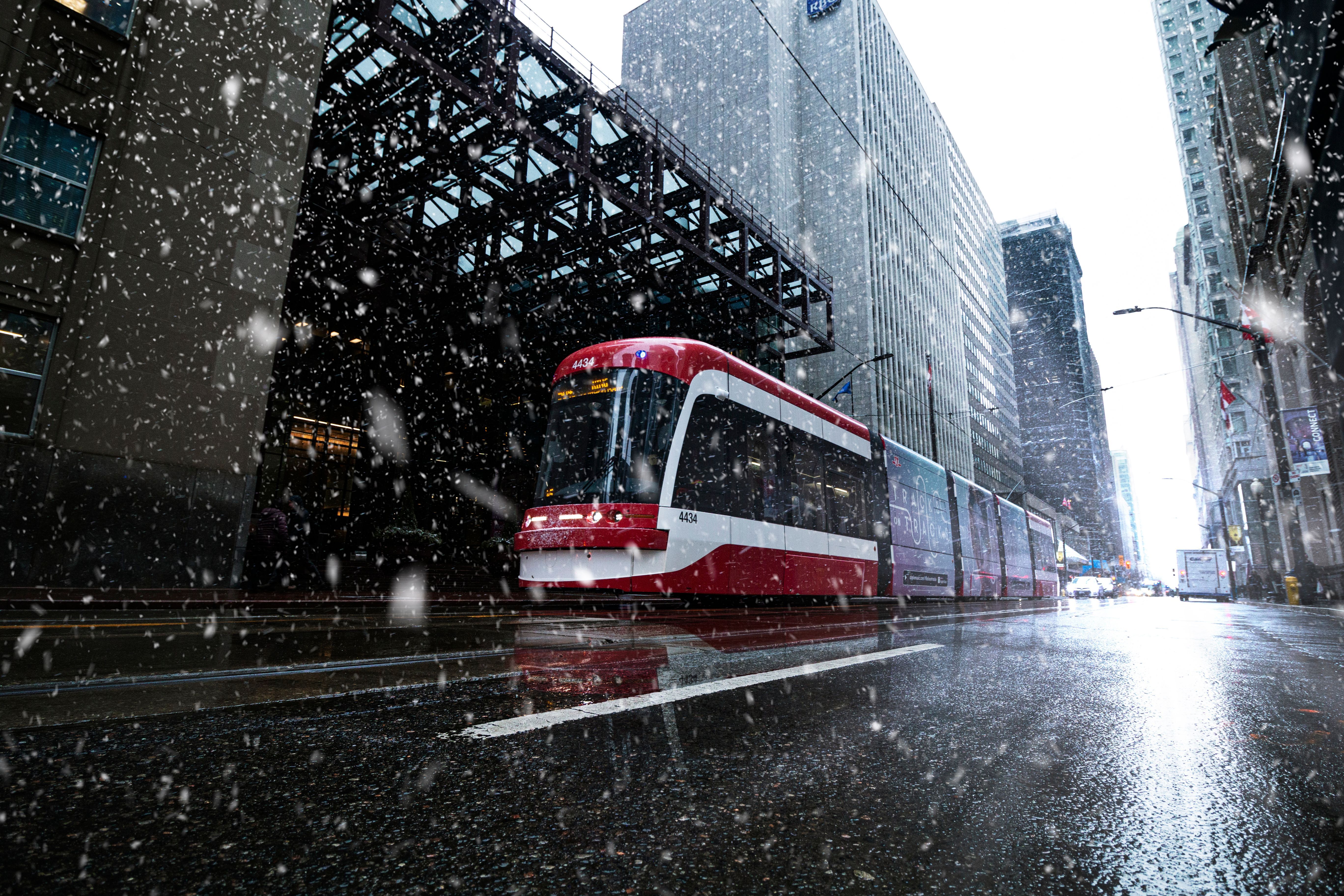 5472x3648 Streetcar Passing Buildings · Free