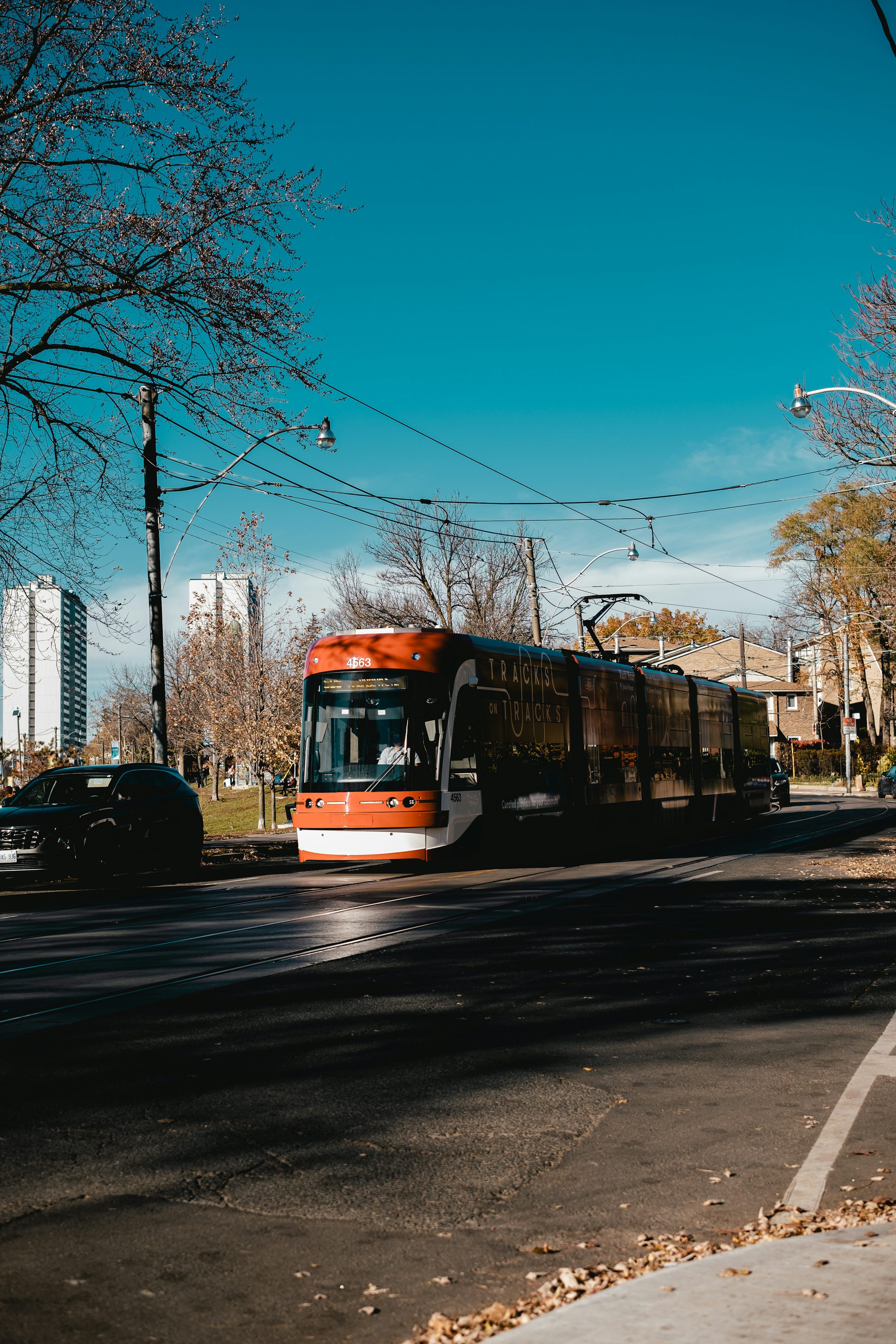 3000x4500 A yellow trolley on a street
