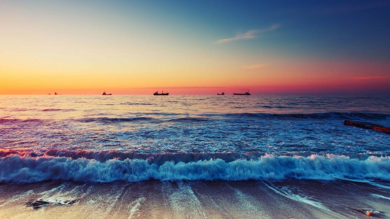 1366x768 Download 1366x768 Ocean, Beach, Sunset, Horizon, Scenic, Waves Wallpaper for Laptop, Notebook