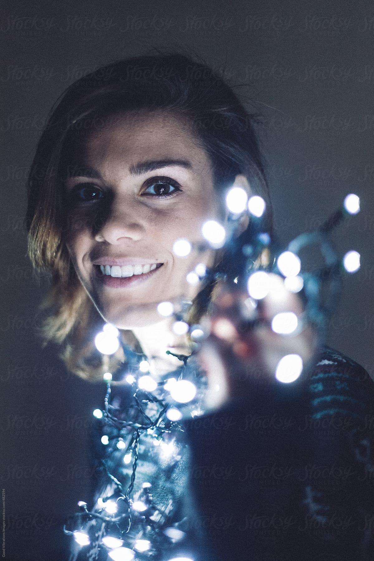 1200x1799 Playful blond woman with led lights by Good Vibrations Image