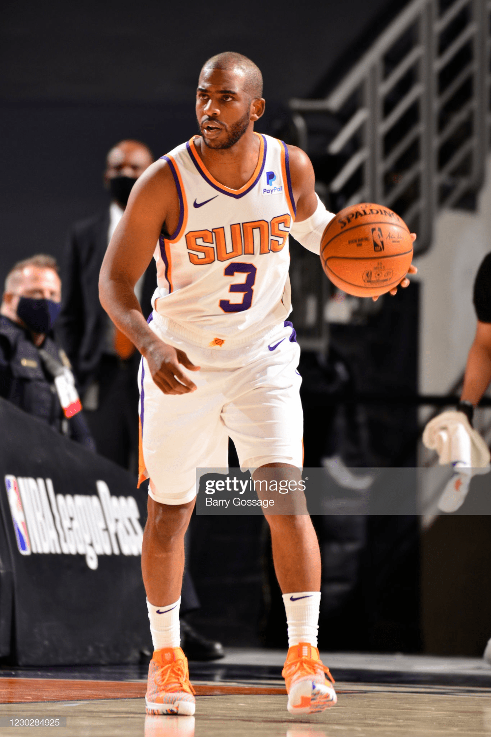 1000x1500 Chris Paul of the Phoenix Suns dribbles the ball against the Dallas. Chris paul, Phoenix suns, Chris paul jersey