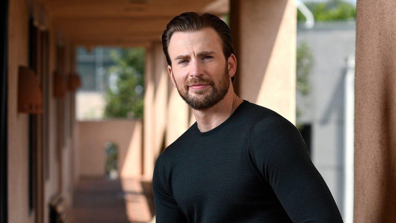 1366x768 Actor Chris Evans With Black T Shirt HD Chris Evans Wallpaper