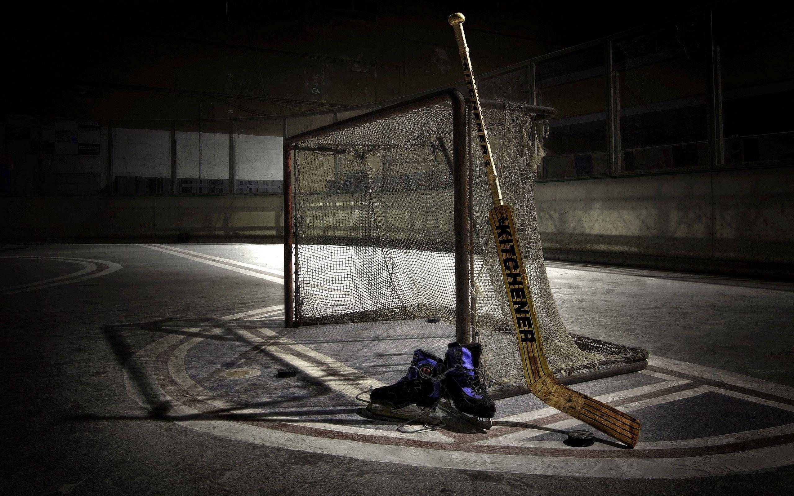 2560x1600 Hockey Stick And Puck Wallpaper