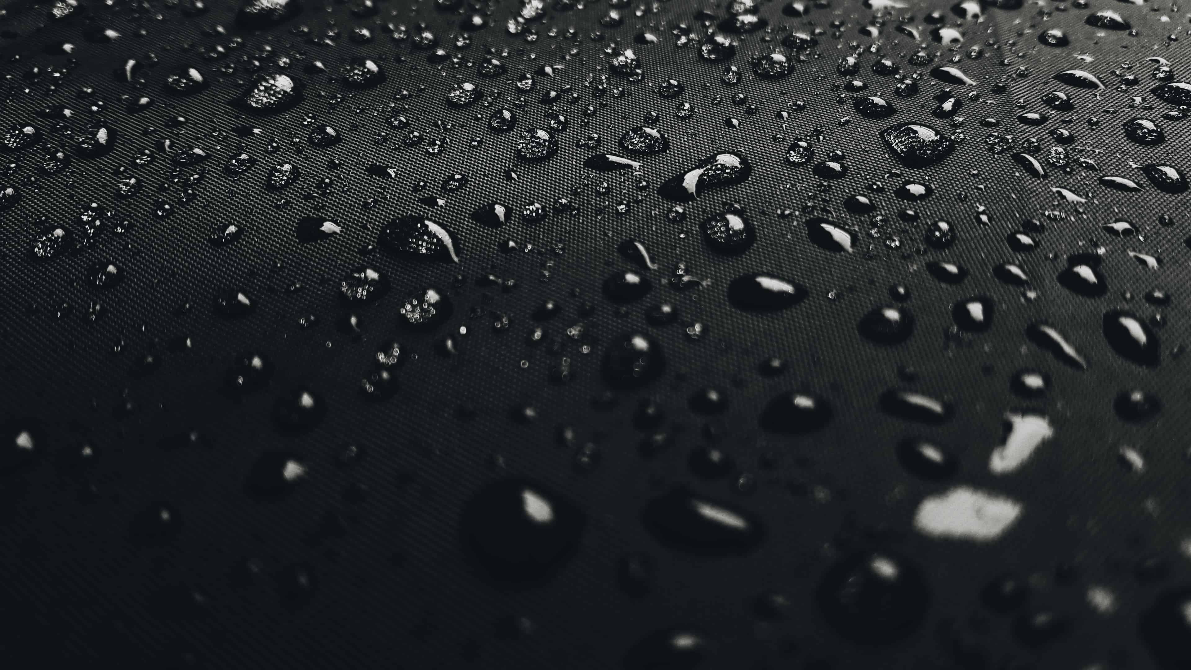3840x2160 Water Drops On Black Surface UHD 4K Wallpaper