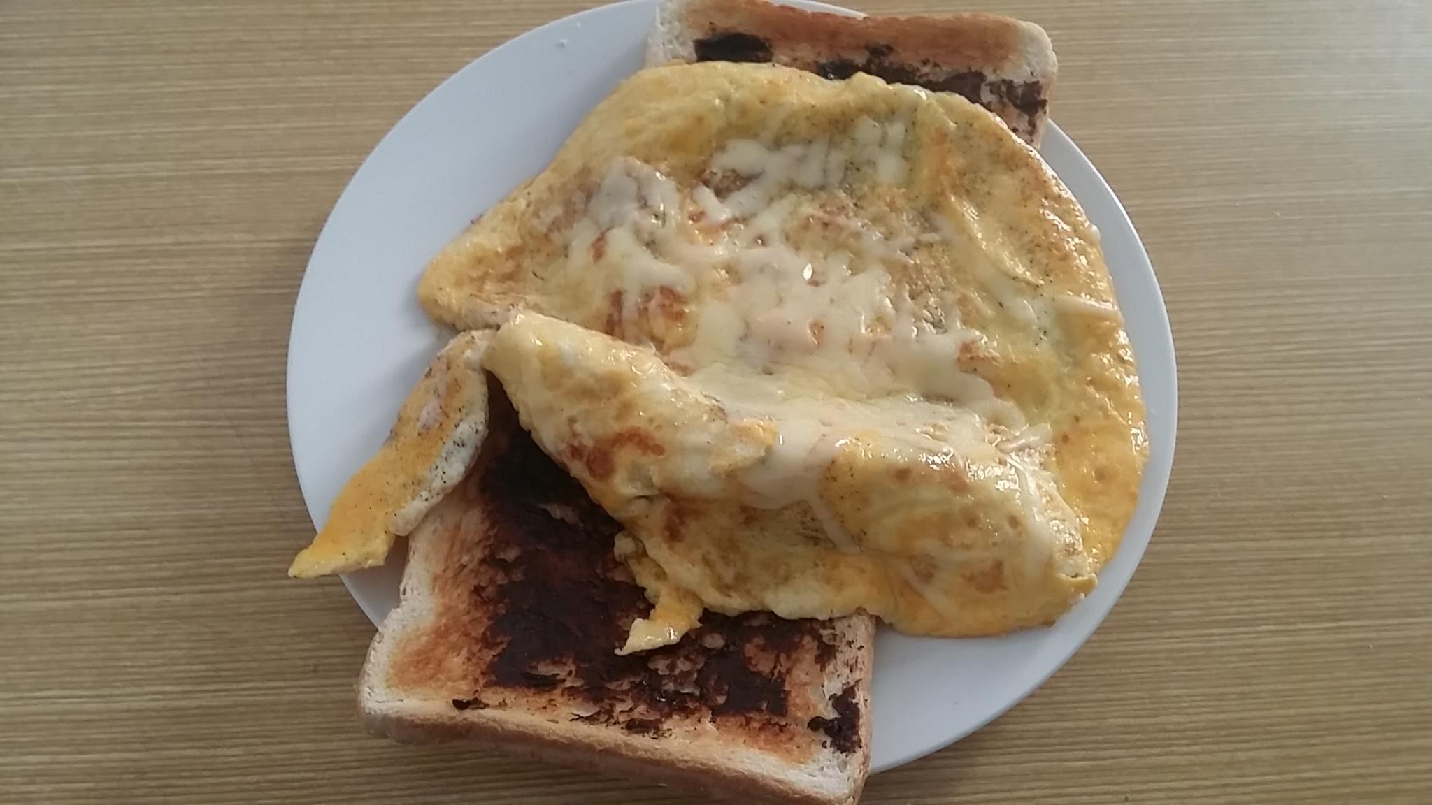 2048x1152 Breakfast: an egg and cheese omelette dumped onto vegemite on toast