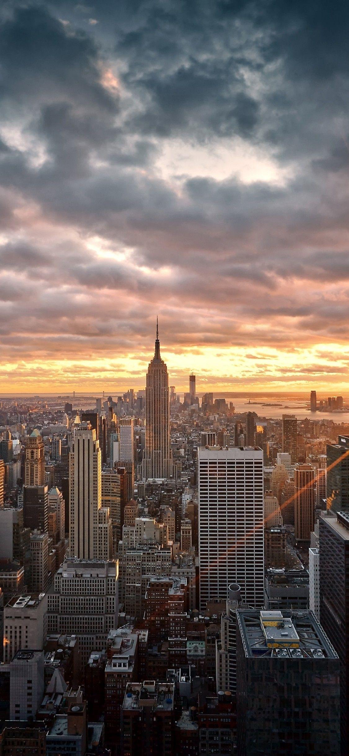1125x2436 Download 1125x2436 New York, Sunset, Dark Clouds, Buildings, Cityscape Wallpaper for iPhone 11 Pro & X