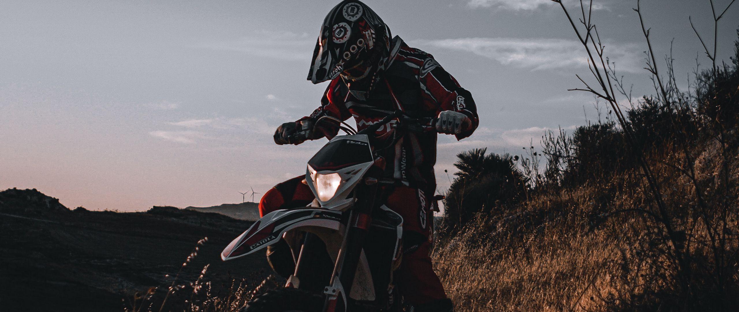 2560x1080 Download wallpaper 2560x1080 motorcycle, motorcyclist, cross, bike, helmet dual wide 1080p HD background