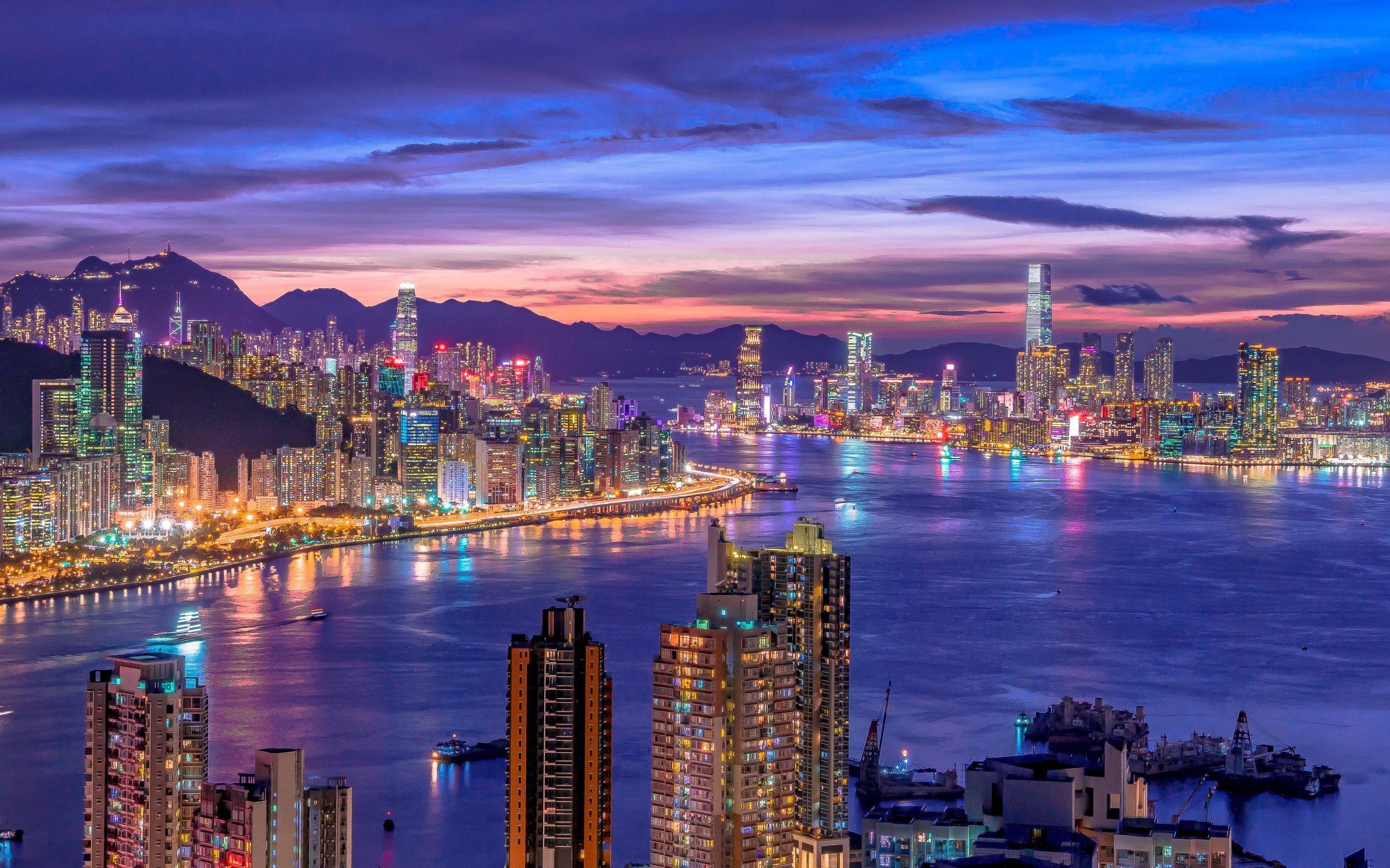 2880x1800 City Skyline 4K Wallpaper, Night life, Cityscape, Hong Kong, Skyscrapers, Purple sky, River, Sunset, World