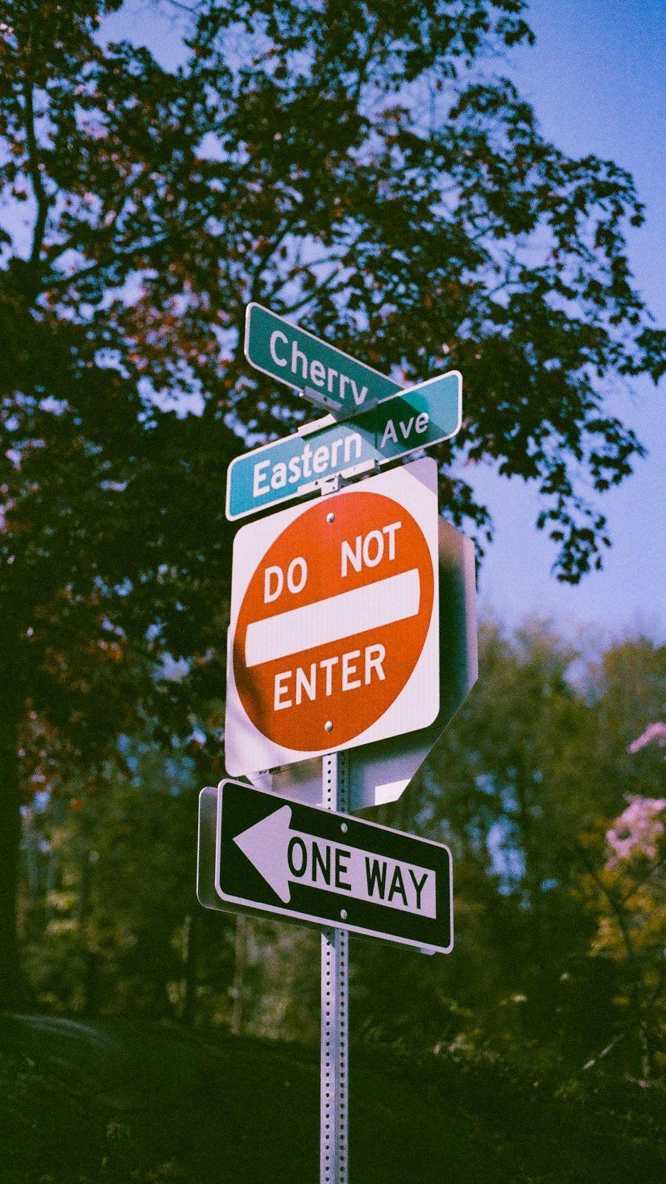 938x1668 Road Signs Wallpaper