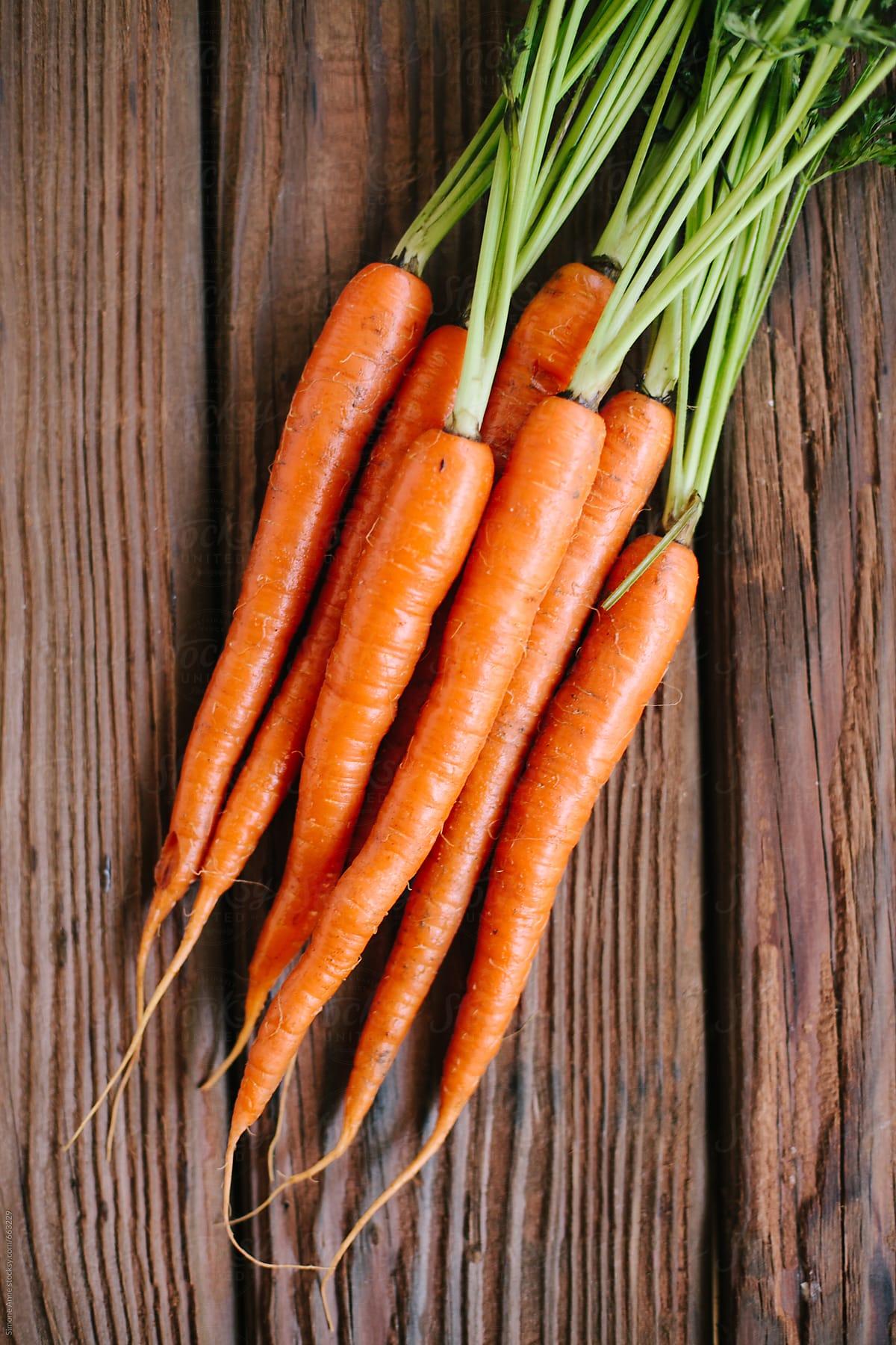 1200x1800 Fresh farm carrots on a wooden table