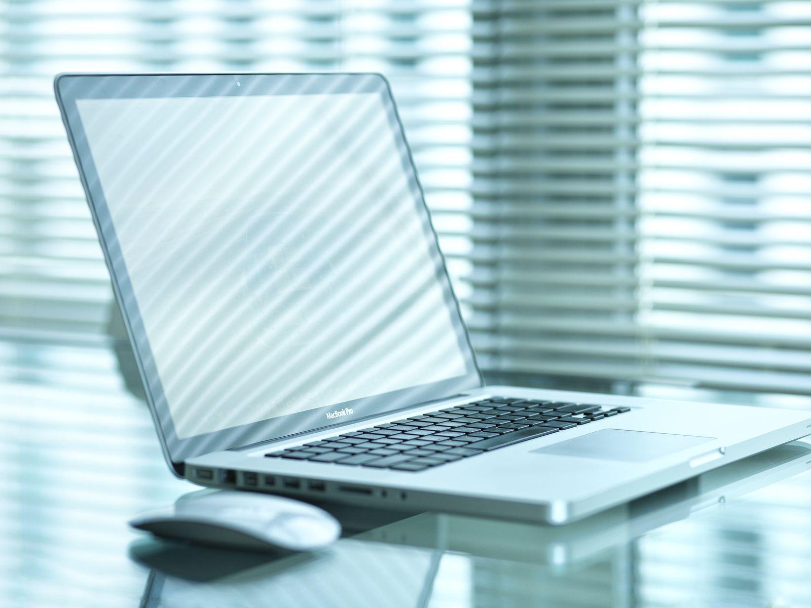 1600x1200 Grey Macbook Pro Laptop On Desk Lights HD Desktop Wallpaper Background Image For Ppt