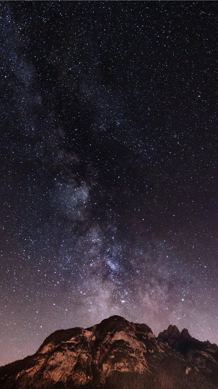 750x1334 brown and black mountain during starry night iPhone 8 Wallpaper Free Download