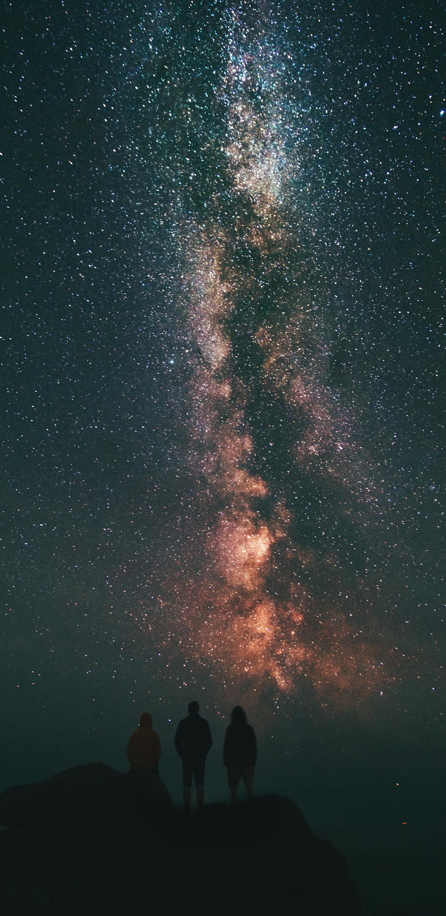 1440x2960 three person looking stars and milky way Phone Wallpaper Download