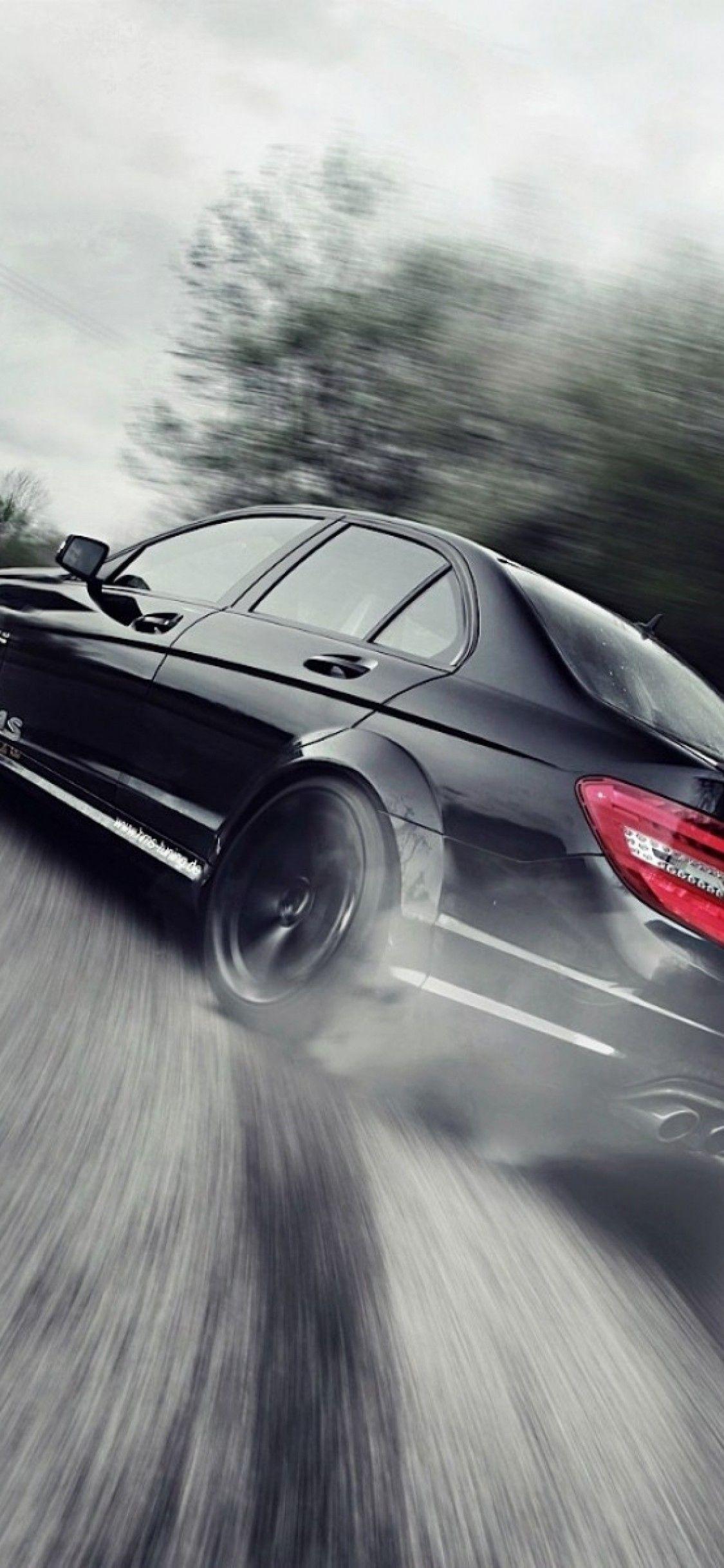 1125x2436 Mercedes C63 Amg Drift HD Wallpaper