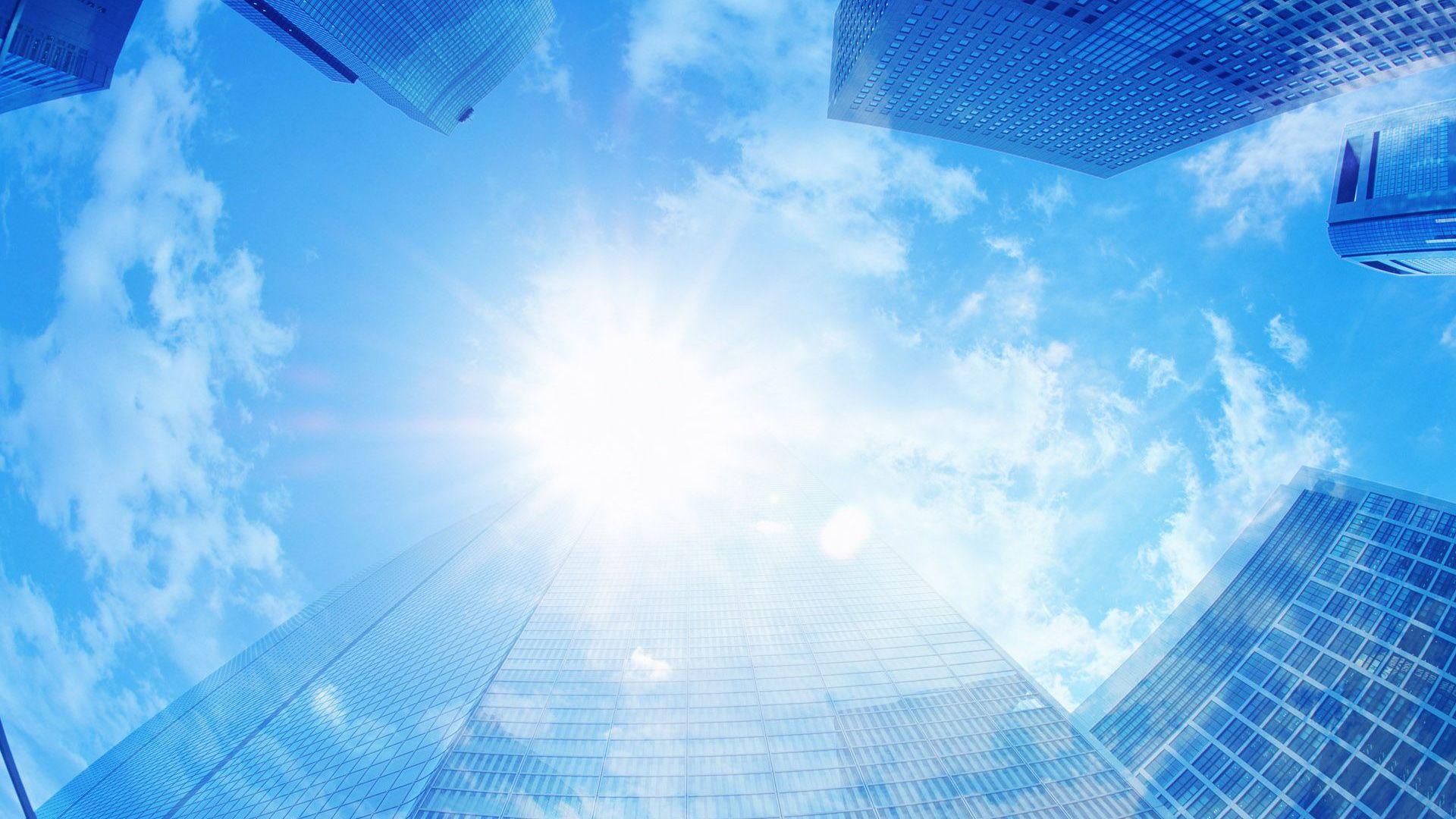 1920x1080 Light Blue Sky With Sun Between High Rising Buildings HD Light Blue Wallpaper