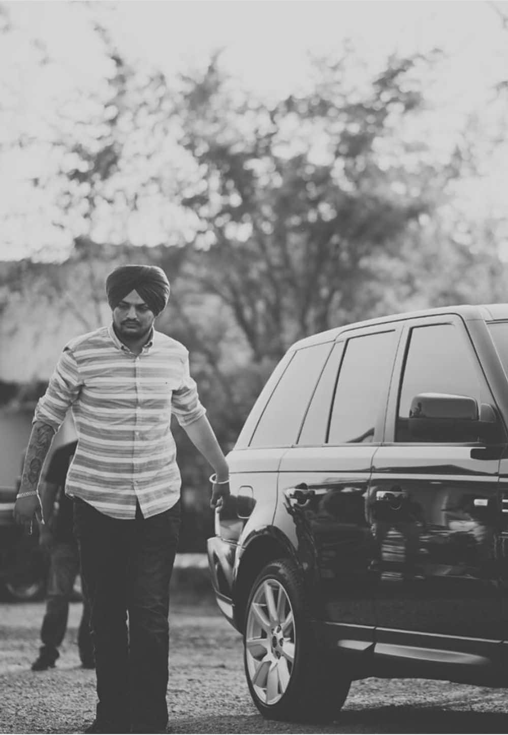 1000x1446 Download Sidhu Moose Wala is Ready for the Show Background