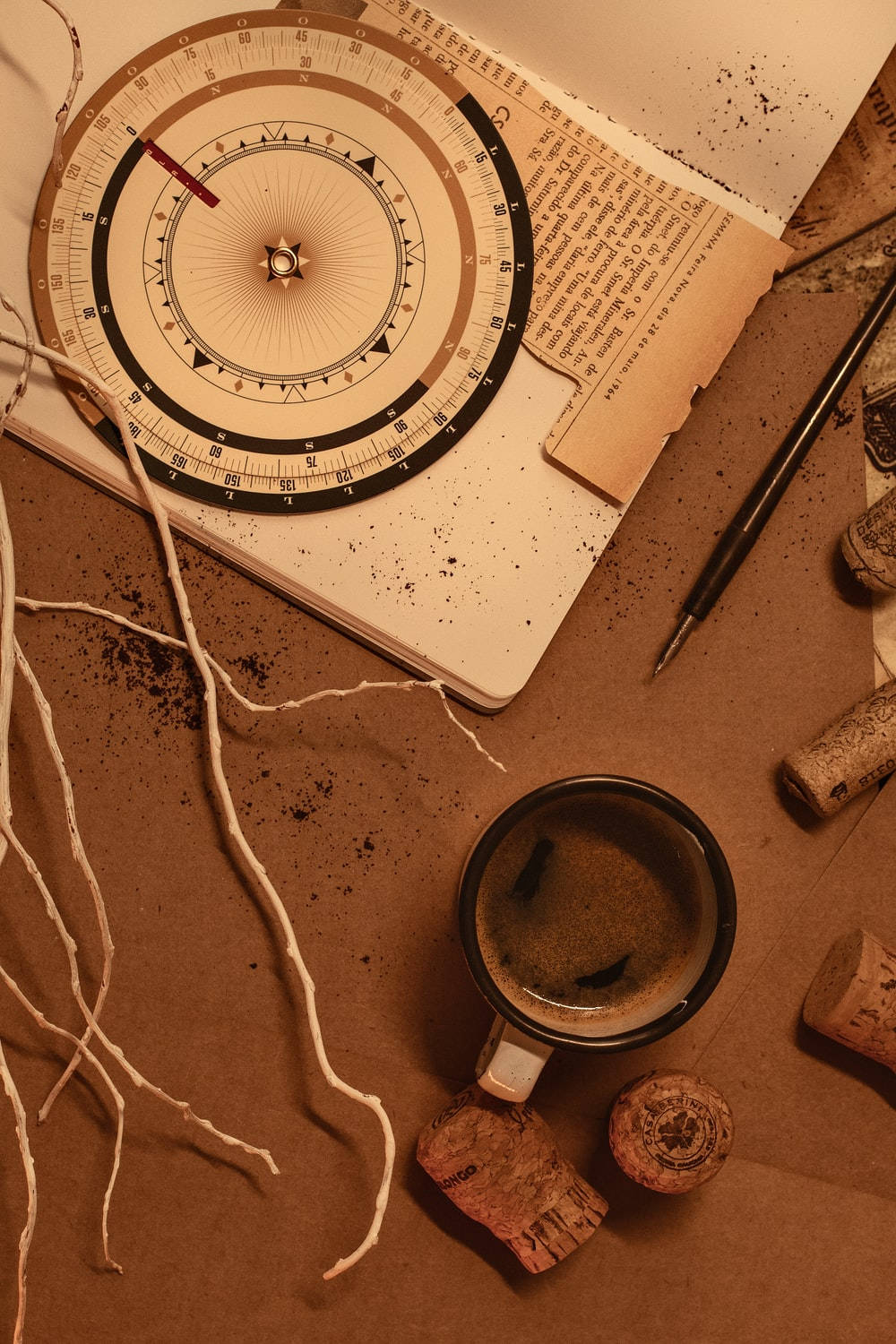 1000x1500 Download Light Brown Aesthetic Compass And Coffee Wallpaper