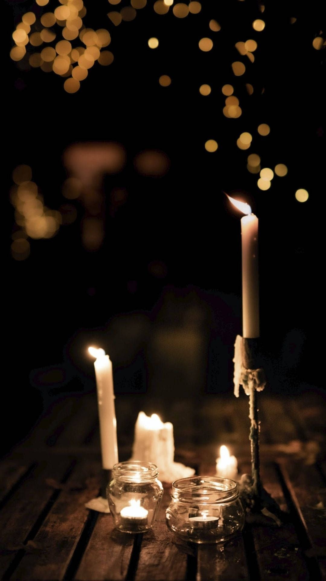 1080x1920 Download Glowing Candles In The Dark Wallpaper